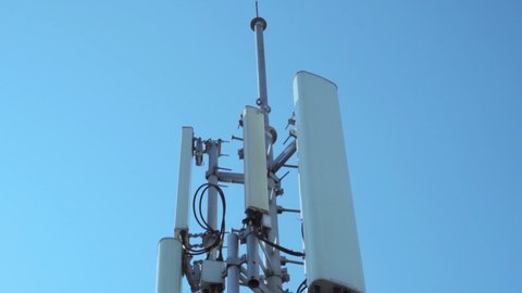Close-up of a cell tower antenna for 3G, 4G or 5G wireless mobile networks and telecommunications Internet connection. Cellular technology.