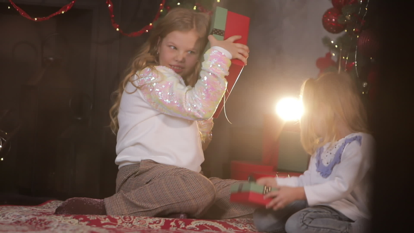 A child girl presses a New Year