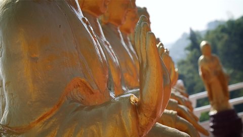 Buddha statues in Fo Guang Shan Buddha museum at Kaohsiung, Taiwan. Mid angle, parallax and tilt movement, slow motion, HD.