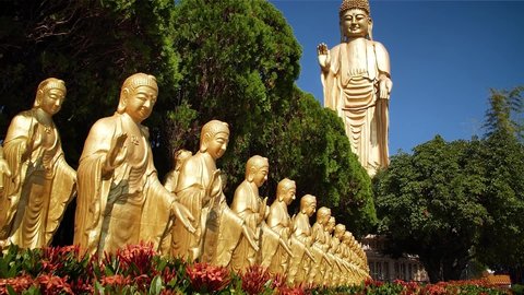 Buddha statues in Fo Guang Shan Buddha museum at Kaohsiung, Taiwan. High angle, parallax movement, slow motion, HD.