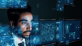 Asian businessman watching hologram screens. GUI (Graphical User Interface). - Powered by Shutterstock - Get 15% off with code: PIKWIZARD15