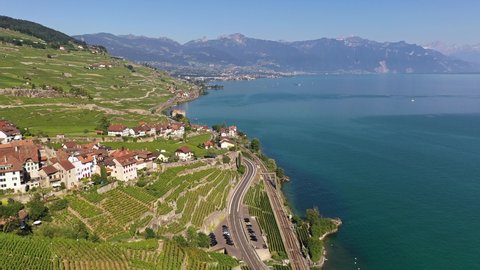 Aerail footage of the Lavaux vineyard and the Rivaz traditional village by lake Geneva in Canton Vaud, Switzerland