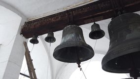 Church bells in the church bell tower, bells of the old temple. Bell towers of the Orthodox Church.