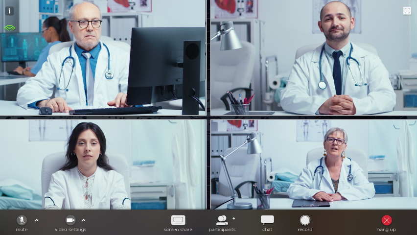 Pc screen webcam view, head shot portrait four medical workers in white coats take part in distant talk, engaged in group video call. Videoconferencing, concilium remote communication concept. Royalty-Free Stock Footage #1065820528