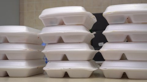 Takeaway food. Online order. Eating takeout amid COVID-19. Meal Prep Polystyrene packaging Containers from the restaurant. Disposable food packaging. Plastic Lunch Boxes