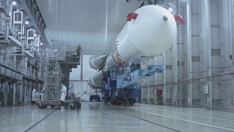 PLESETSK, RUSSIA - 22.11.20: Construction of the Soyuz 2 space rocket. A spaceship in a military hangar. Prepares space rocket for launch. Space technologies.