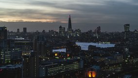 Establishing Aerial View Shot of London UK, beautiful skyline after sunset, United Kingdom