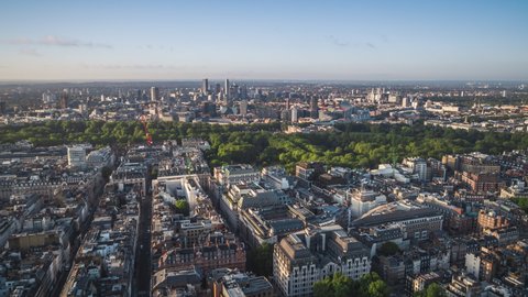Establishing Aerial View Shot of London UK Mayfair and Victoria, Buckingham Palace, United Kingdom , beautiful sunny day