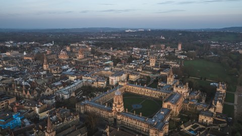Establishing Aerial View Shot of Oxford UK, old town, United Kingdom, track back