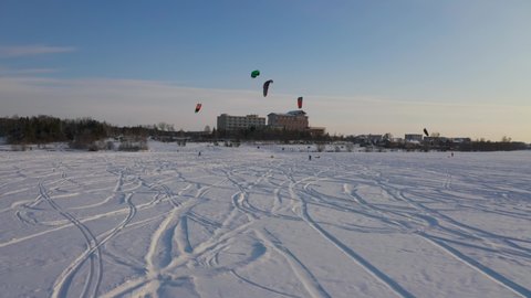 sportsman control snow kiting, general plan, day, shooting from a drone