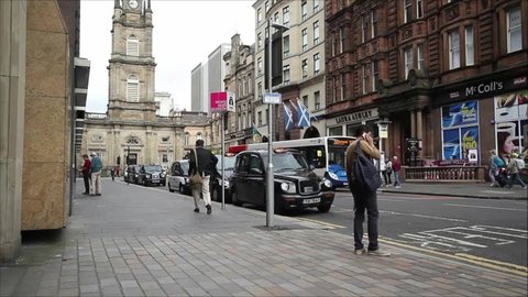 14 June, 2015, people walking and the traffic at West George Street, Glasgow, Scotland 