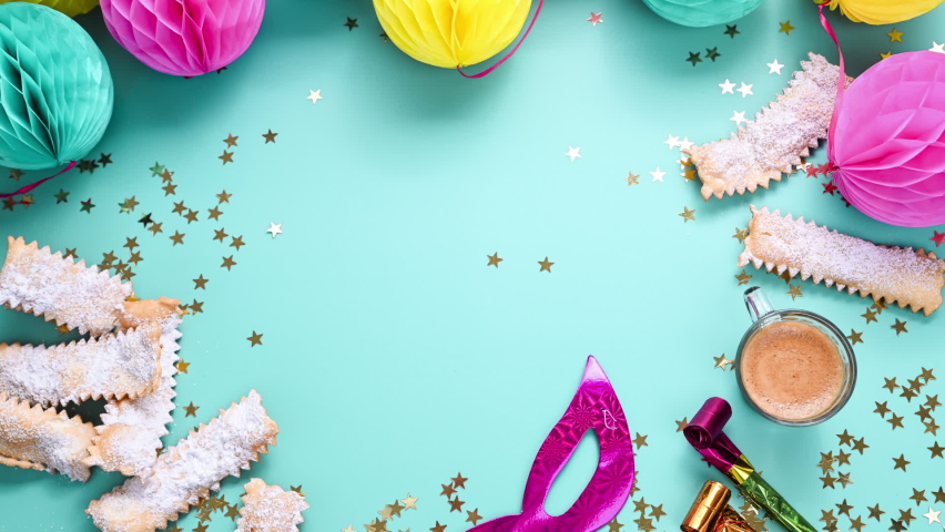 New mask during the covid period for the carnival. Fragrant espresso in a bright mug and called crostoli on a blue background. Delicious carnival sweets typical of the Italian tradition chiacchere. 