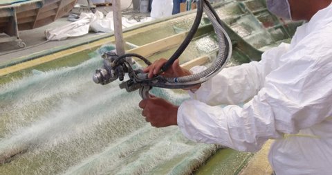 Boat fiberglass processing man work