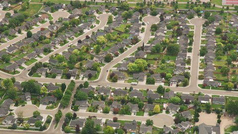 Idaho circa-2019. Aerial view of homes in residential area of Idaho. Shot from helicopter with Cineflex gimbal and RED 8K camera.