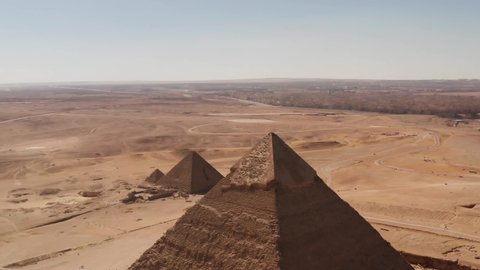 Landscape view of Pyramid of Khafre, and menkaure Giza pyramids landscape. historical egypt pyramids shot by drone.