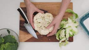 How to cut cauliflower into florets. Step by step close up video, flat lay