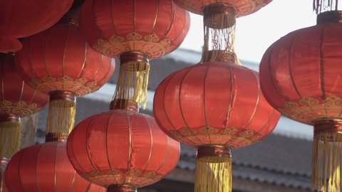 Group of Chinese lanterns in temple.