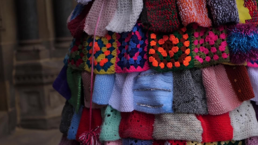 Display of knitted wool patchwork medium shot