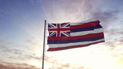State flag of Hawaii waving in the wind. Dramatic sky background. 4K