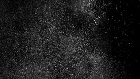Particle gold dust flickering on black background. Gold Dust Waves. Gold Particles Moving Background. Particle from below. 4k abstract Footage background for text.
