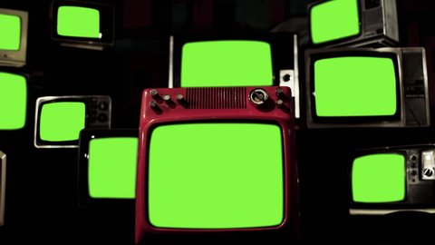 Pile of Vintage Televisions turning on Green Screens with Color Bars. 4K Resolution. 