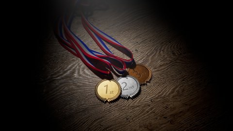 Set of shiny Olympic awards for top three winners. Silver, gold, bronze sports medals with ribbons. First prize for the champions. Symbol of winning competition, success, victory, championship. Pride.