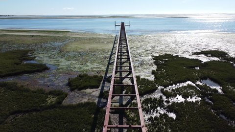 Abandoned pier in Ria Formosa Natural Park, Olhao, Portugal.