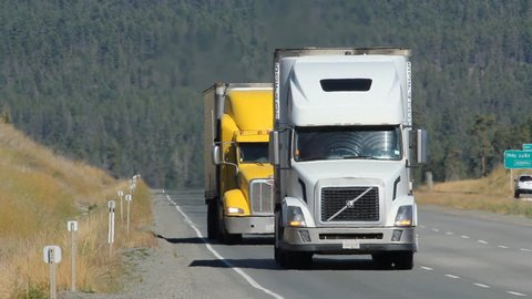 BC, CANADA on SEPT 21st: Trucks on Highway 5 in BC, Canada. The portion of Highway 5 south of Kamloops is also known as the Coquihalla Highway.