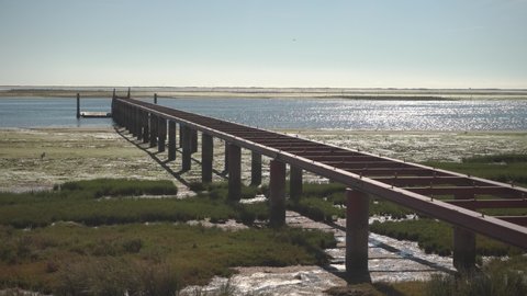 Static footage of jetty in Ria Formosa Natural Park, Algarve, Portugal.