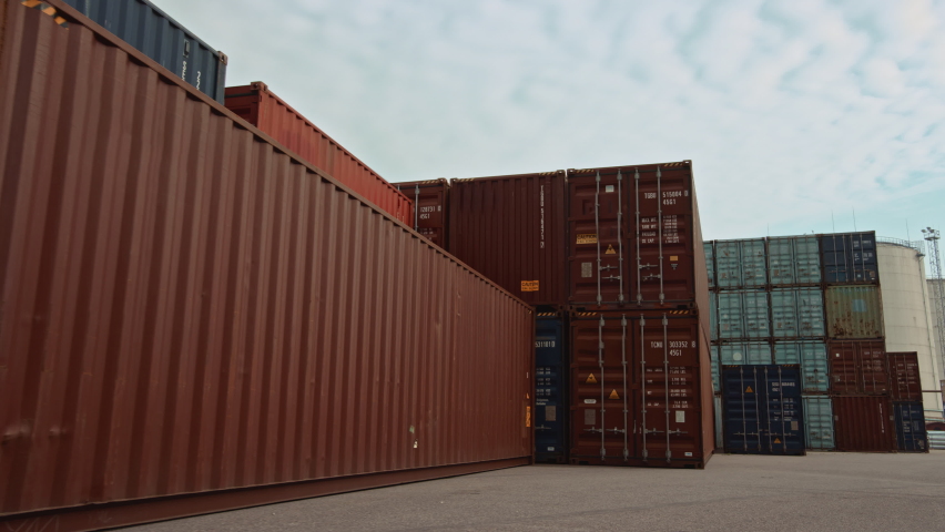 VFX Concept: Augmented Reality Visualization Creating 3D Graphics Over Shipping Containers in the Terminal. Futuristic Animation Effect Shows Online Connectivity of Every Unit to the Logistics Center. Royalty-Free Stock Footage #1065943336