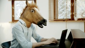 Business man with Horse Mask Working at Home Office Video Call