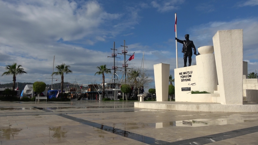 Beskaza square, Fethiye, Turkey - 13th of January 2021: 4K After rain the Ataturk statue on the Bezkaza square
