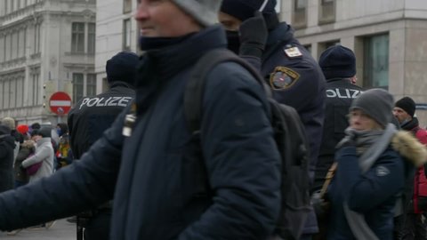 "Vienna, Austria - 01.16.2021" Austrian policemen at anti covid19 rally