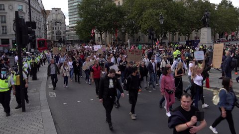 London , United Kingdom (UK) - 09 05 2020: QAnon Save Our Children protestors march through London