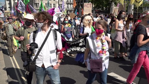 London , United Kingdom (UK) - 09 01 2020: Extinction Rebellion protestors dressed as Alice in Wonderland and the White Rabbit