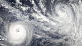 Double hurricane storm, tornado top view. Elements of this video furnished by NASA. Animation of giant hurricane seen from outer space