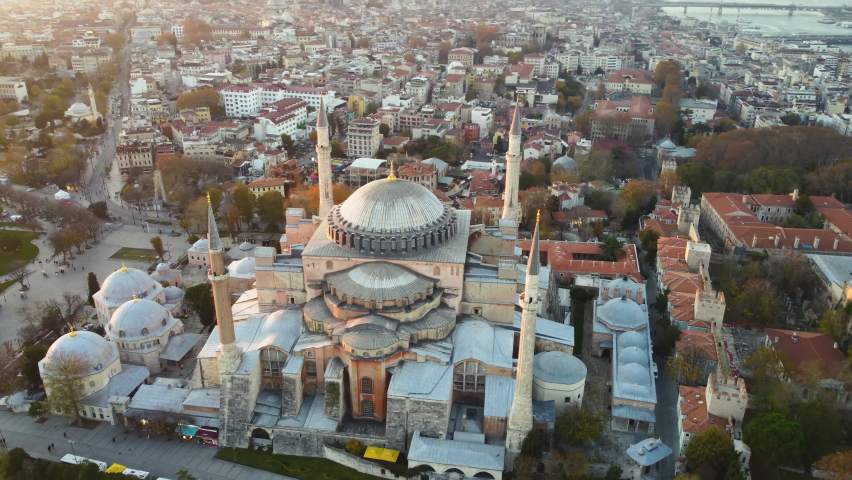 The first rays of the sun illuminate the ancient city of Istanbul  (Constantinople). Aerial view of Hagia Sophia mosque