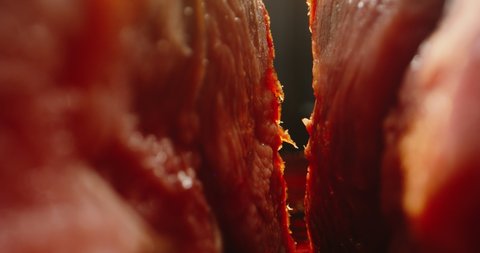 Big piece of roasted steak, tasty meat cut. Macro shot of grilled steak on chefs preparation table, 4k footage