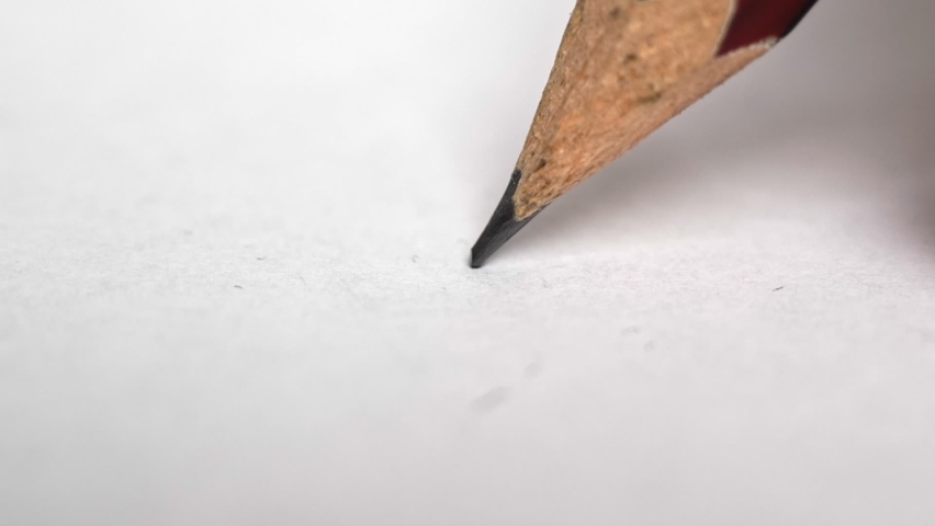Pencil draws a heart on a white background