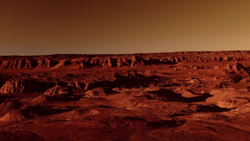 Fantastic martian landscape in rusty orange shades, Mars surface, Desert, Cliffs, sand. Alien landscape. Red planet mars. Royalty-Free Stock Footage #1066053916
