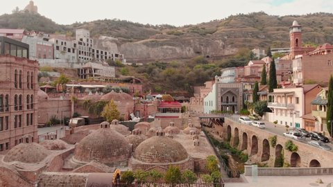 Tbilisi, Georgia-15th october, 2020. Rising view of Royal baths domes and old tbilisi buildings exterior.Tourism during pandemic in caucasus