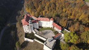 Aerial video of Pieskowa Skala Castle in autumn