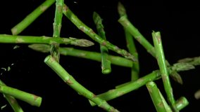 Super Slow Motion Shot of Flying Asparagus, Collision in the Air at 1000fps. - Powered by Shutterstock - Get 15% off with code: PIKWIZARD15