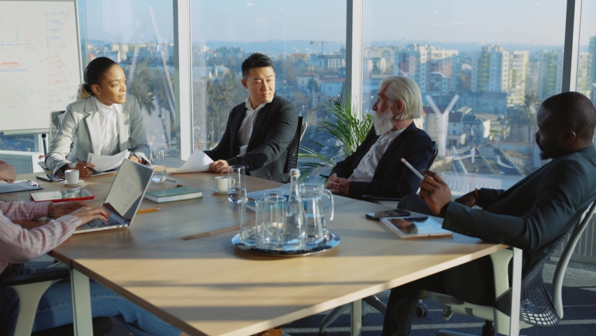 International group of business parnters gathering for office boardroom meeting negotiating corporate plans for future. Marketing lecture. Meeting. Royalty-Free Stock Footage #1066102477