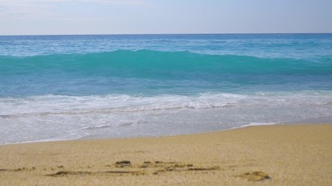 Mediterranean sea, waves and sand beach