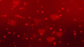 Red heart shapes falling on a dark background. Simple Happy Valentine's day animation