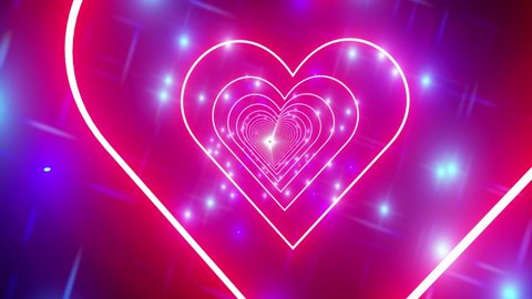 Hearts as background. valentines day concept. Neon hearts fly towards the camera.