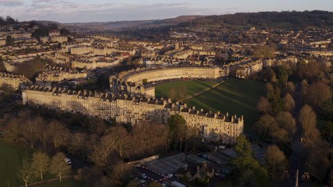 Aerial shot of the royal crescent located in the city of Bath at sunset on a winters day.