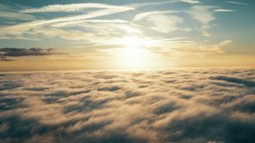 Aerial Drone fly above the clouds at sunset sky