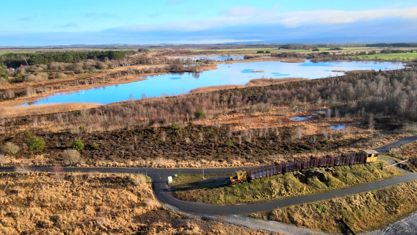 Aerial view over Lough Boora. A stunning scenery of Boora lake surrounded by variety of wetland and woodland areas. Lough Boora from County Offaly in Ireland.